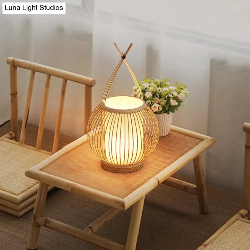 Beige Asian Style Bamboo Lantern Desk Light with Parchment Shade - Single Bulb Night Table Lamp