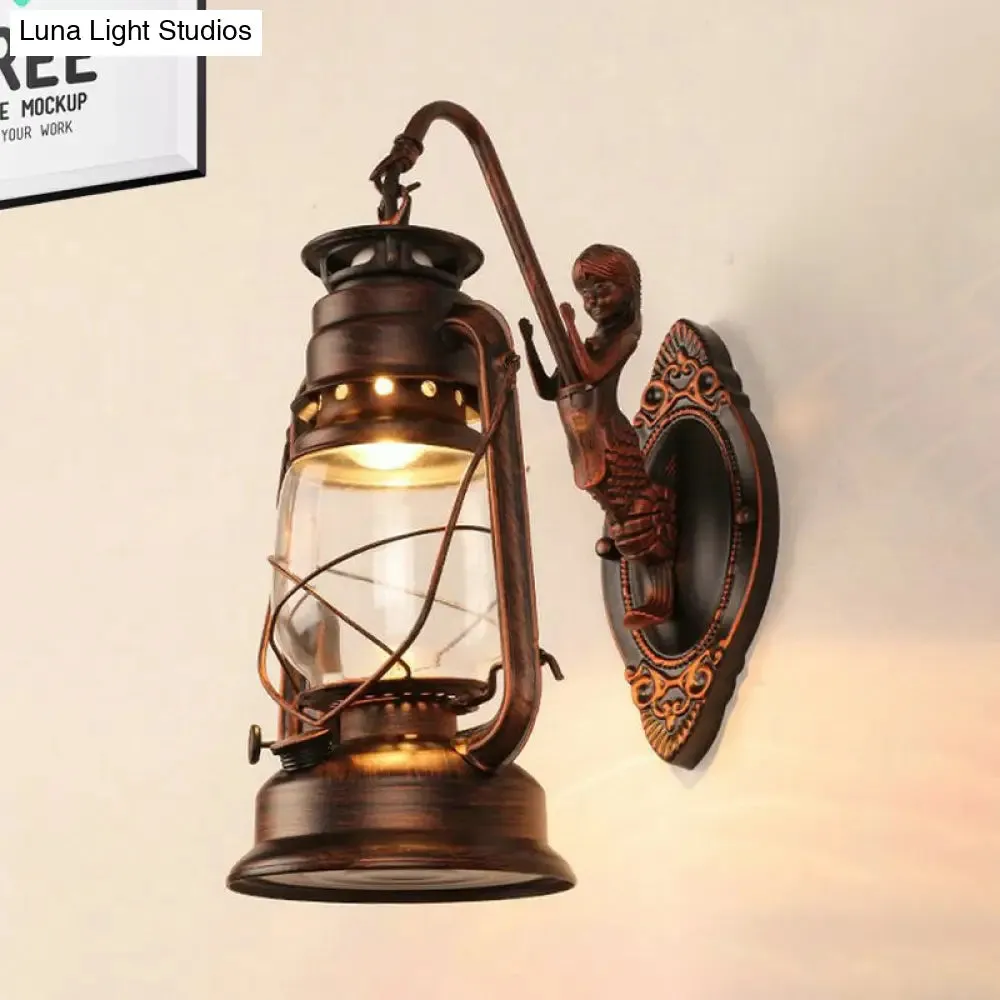 Coastal Bedroom Wall Light with Lantern Shade - Clear Glass Sconce in Black/Antique Brass/Weathered Copper with Mermaid