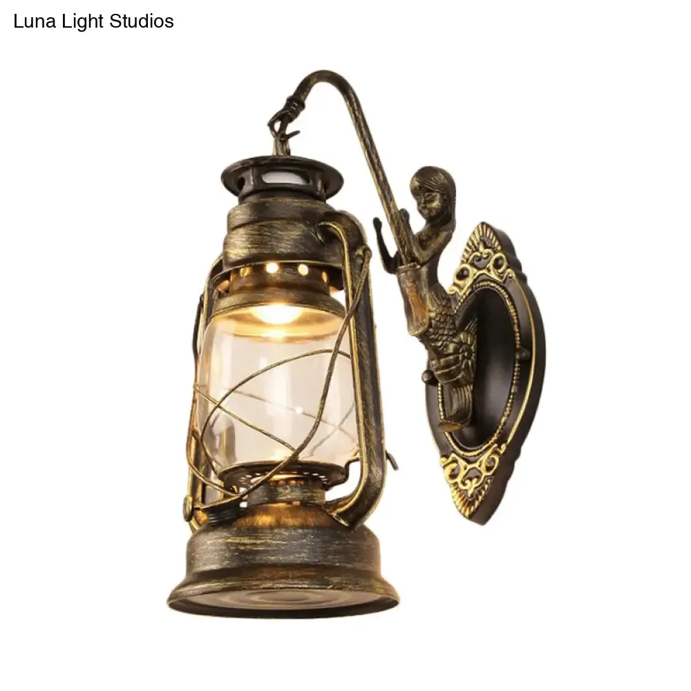 Coastal Bedroom Wall Light with Lantern Shade - Clear Glass Sconce in Black/Antique Brass/Weathered Copper with Mermaid