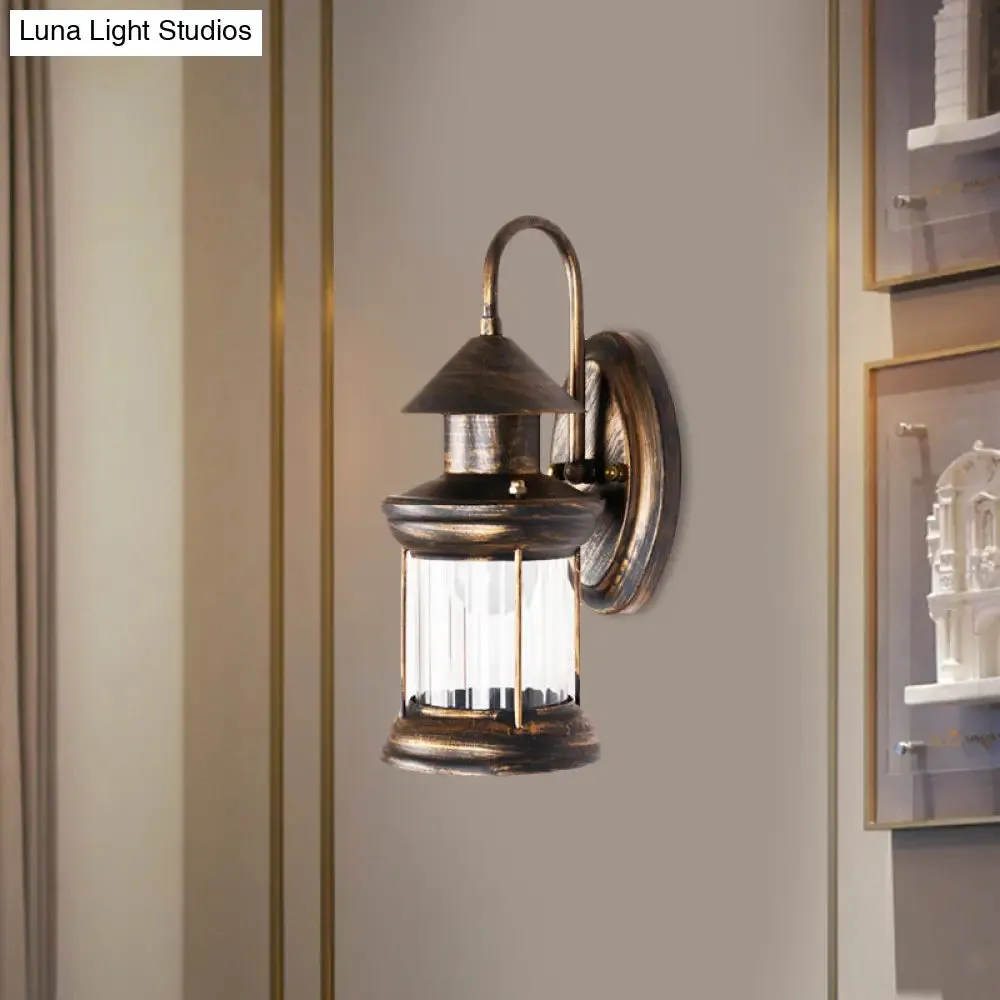 Coastal Brass Metallic Lantern Wall Mount Lamp with Curvy Arm - 1 Bulb Sconce