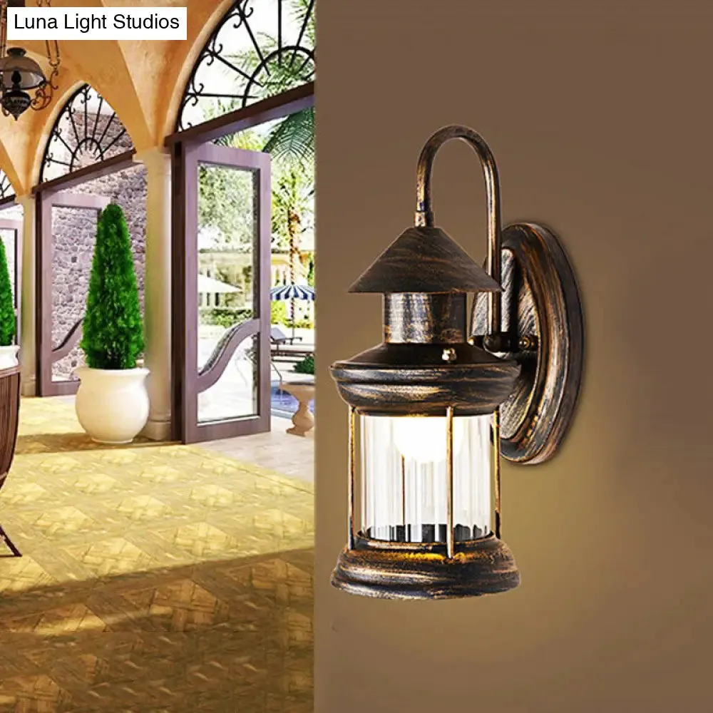 Coastal Brass Metallic Lantern Wall Mount Lamp with Curvy Arm - 1 Bulb Sconce