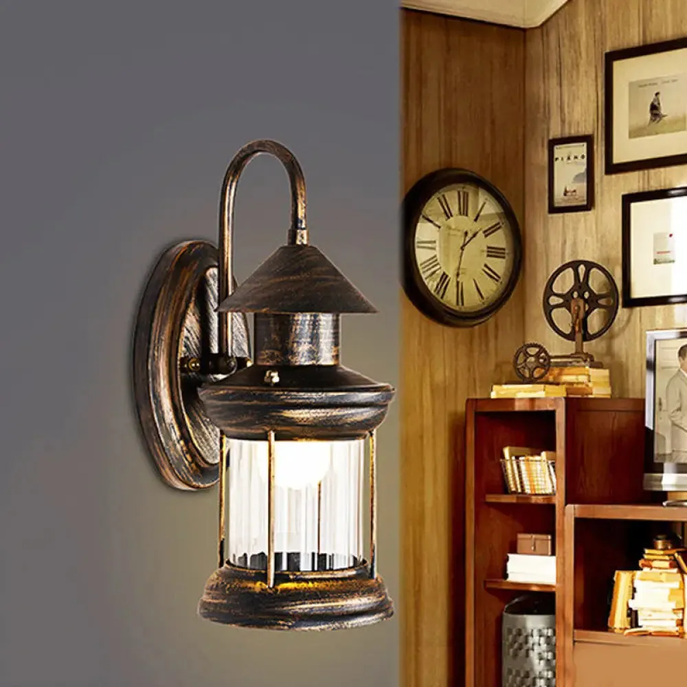 Coastal Brass Metallic Lantern Wall Mount Lamp with Curvy Arm - 1 Bulb Sconce