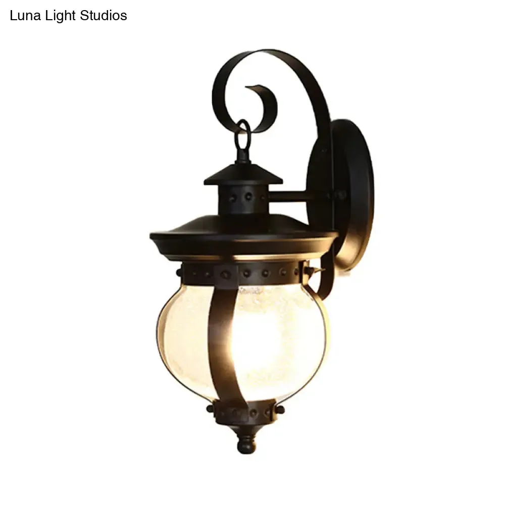 Industrial Seeded Glass Wall Lamp with Curved Arm for Bedroom - Single Bulb Sconce Light