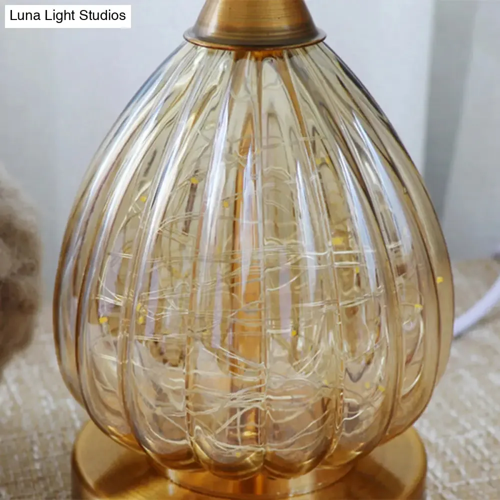 Modern Amber Glass Droplet Night Light with White Table Lamp and Feather Shade