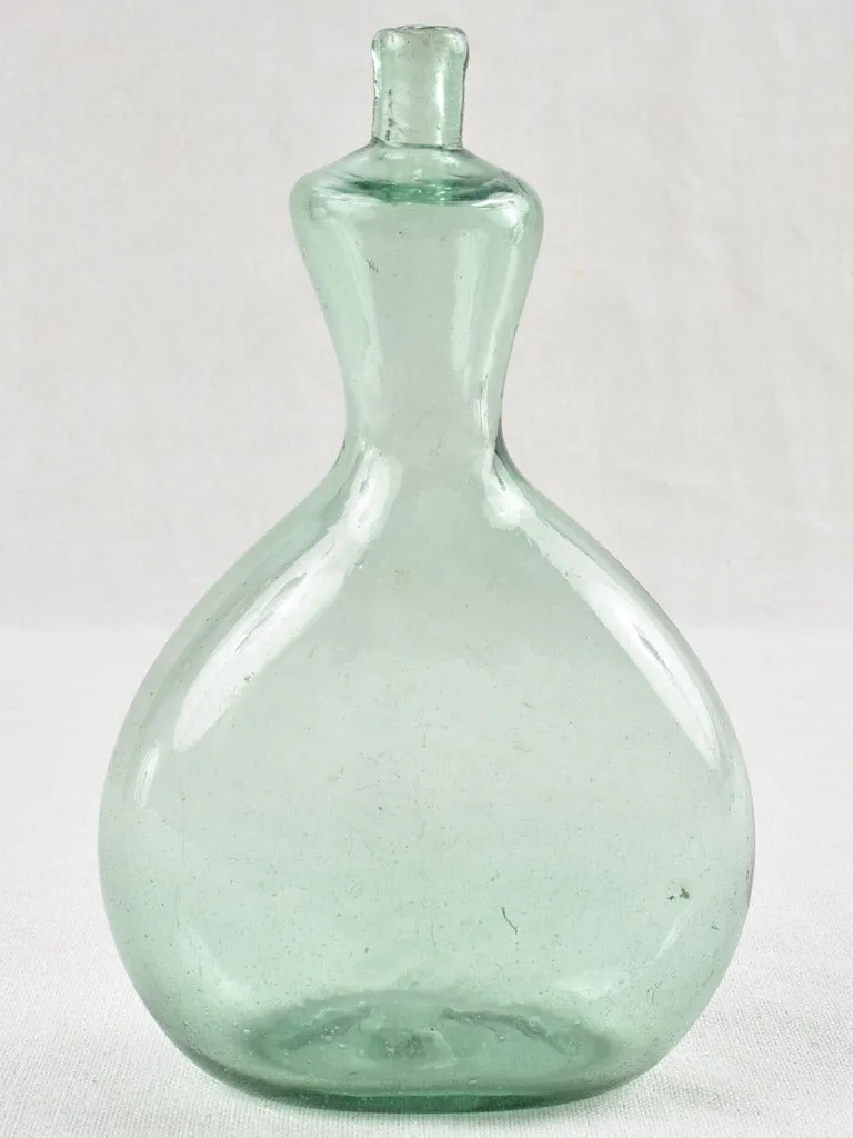 Small antique blown-glass lamb's milk bottle 8¼"